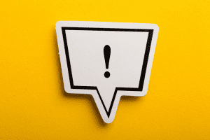 Exclamation point in a speech bubble