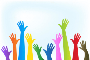 Colorful hands raised in the air